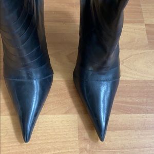 Black stiletto heeled boots